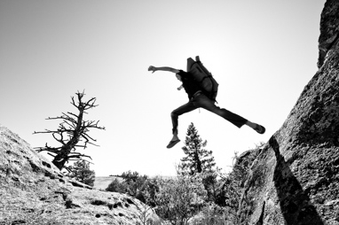 Kestrel Green on the way to climb in his back yard. Hidden Gulch, Del Norte, CO.